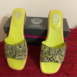 Vince Camuto Slides with snakes skin pattern on top.